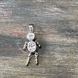 Silver child charm with clear stones